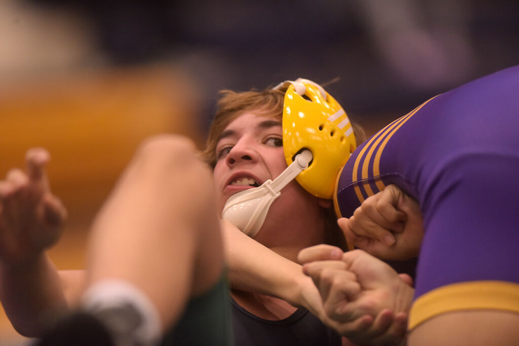 Rock Bridge's Connor Marshall attempts to escape from a lock